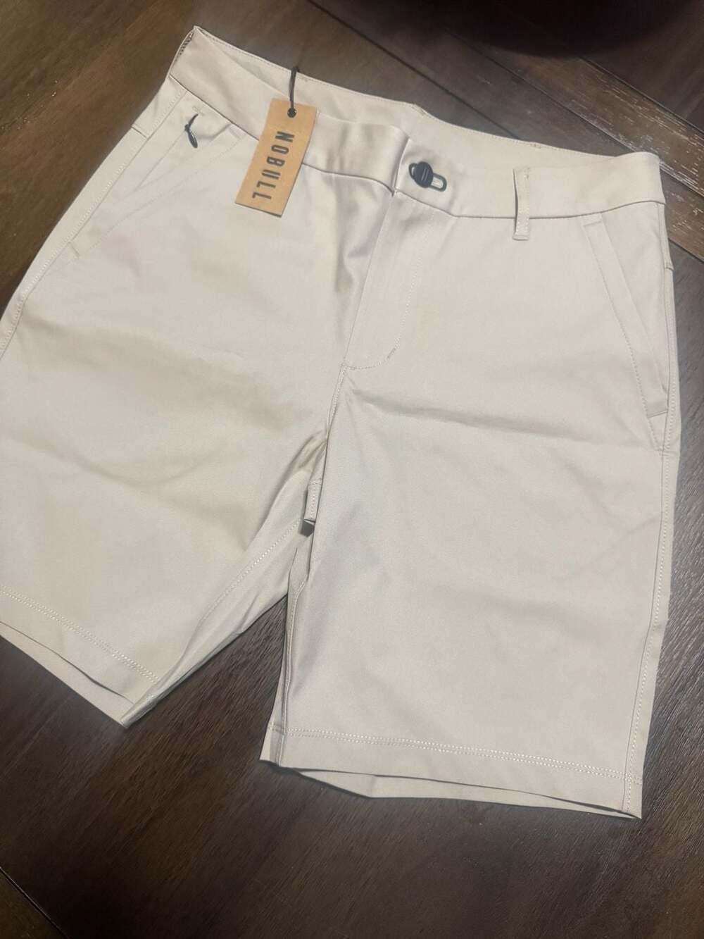 NOBULL DLMKR Chn Shrt Size 28 Sand Chino